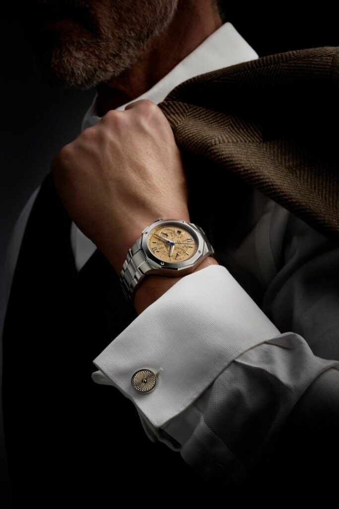 Montre Riviera Flyback 10828 dorée Baume & Mercier Arles dumas horloger